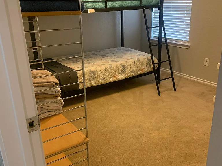 Bedroom 4 has a set of twin bunk beds.