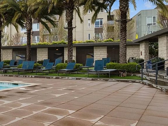 Clubhouse + Junior Olympic pool (cabanas, BBQs, fire pits). Community lounge, private cabanas and outdoor gaming areas