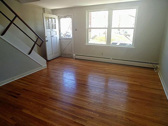 Large living room with lots of natural light
