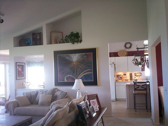 Soaring vaulted ceilings and decor ledges throughout this home.