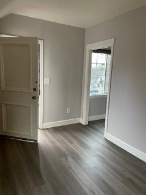 living area (looking at front door and bedroom entrance)