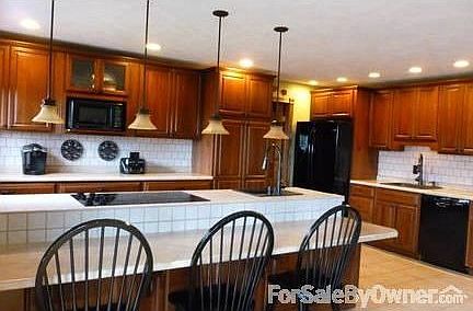 Kitchen with 2 sinks, all appliances
						:
						10 ft table height counter for snacks, making cookies, homework.