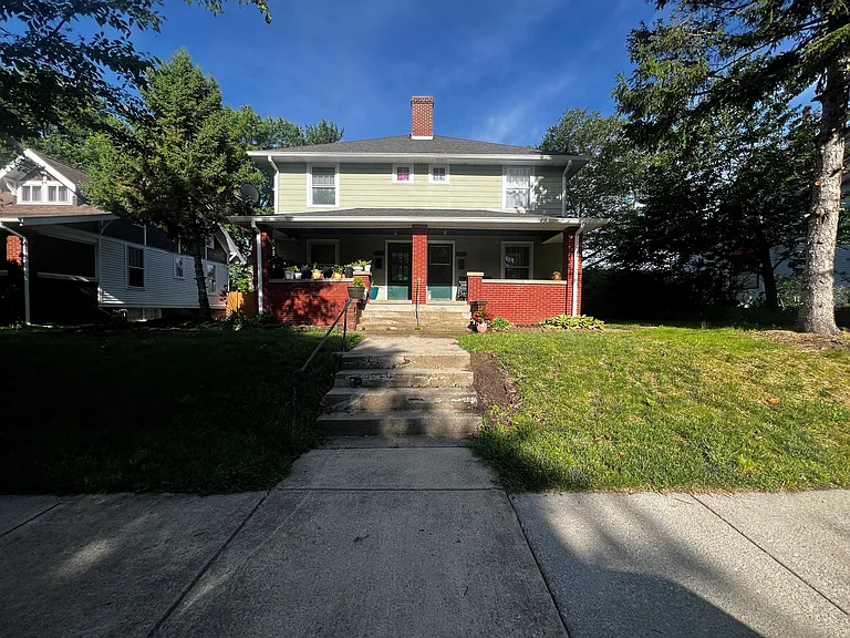 The view from the front porch. The home has two units and 1006 is to the south, or the left side of the home.