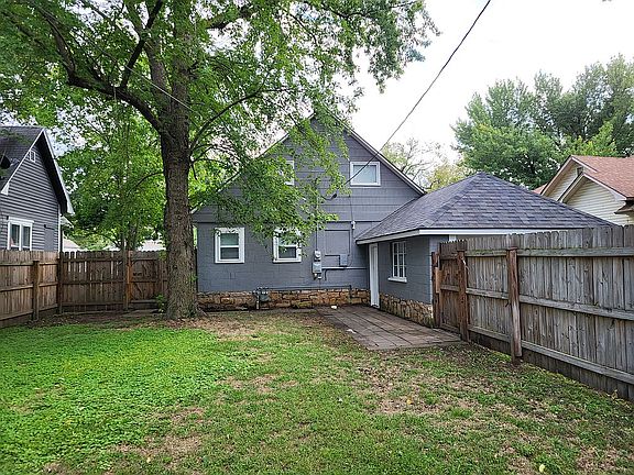 Wood fenced in yard.