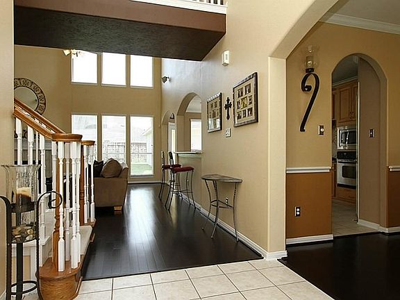 Hardwoods extend from entry to dining, family room and master bedroom