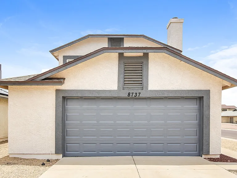 8737 W Bluefield Ave — Photo 1