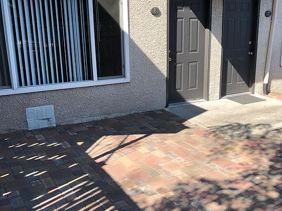 View of front door from patio.