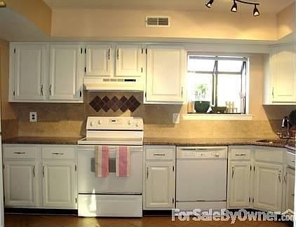 Kitchen
						:
						Granite countertop, updated cabinet, garden window, tiled floor, track lights.