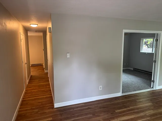 From front door, you are in family room, straight to kitchen, bedrooms and bath.