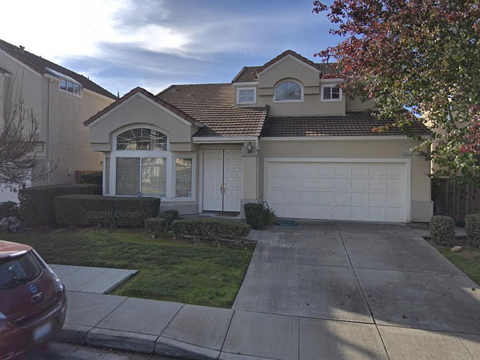 front of the house with 2 car-garage