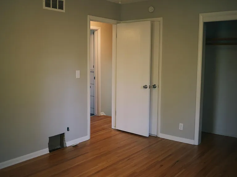 Another view of the master bedroom, which is adjacent to 2nd bedroom upstairs and directly across from the full bath with double vanity and built in storage. Large closet with sliding doors.