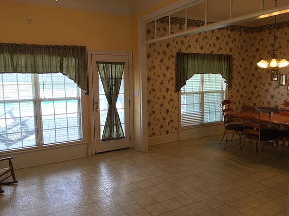 Sun Room with View of Pool