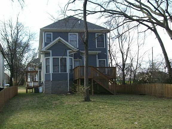 Large unfenced back yard and off-street parking in rear