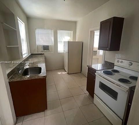 4th image of 1060 NW 47th St APT 7