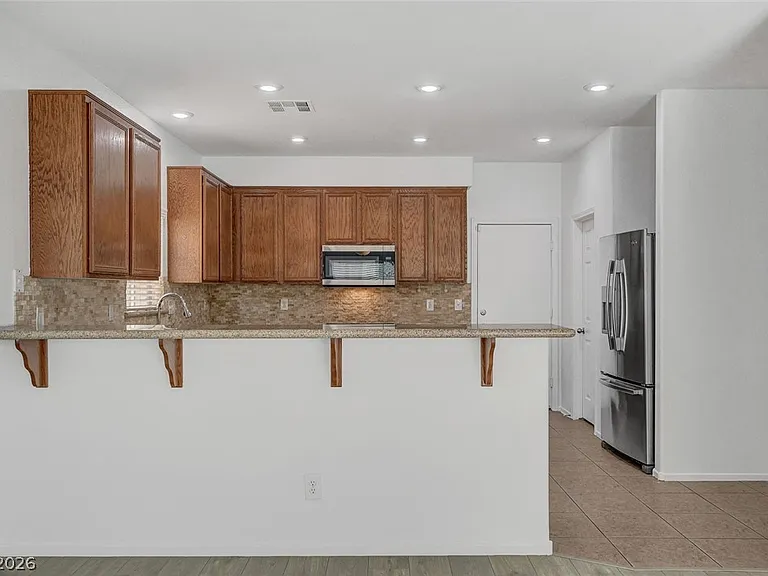 10439 Calypso Cave St — Photo 14