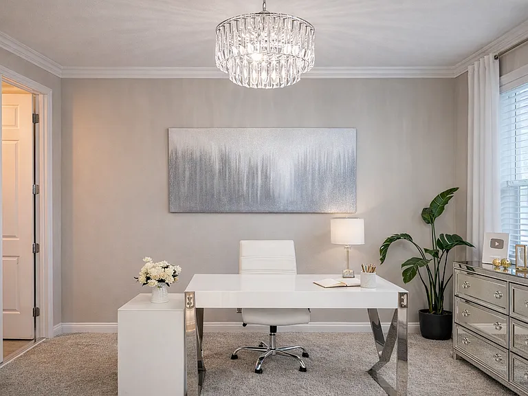 Main floor bedroom with crystal chandellier