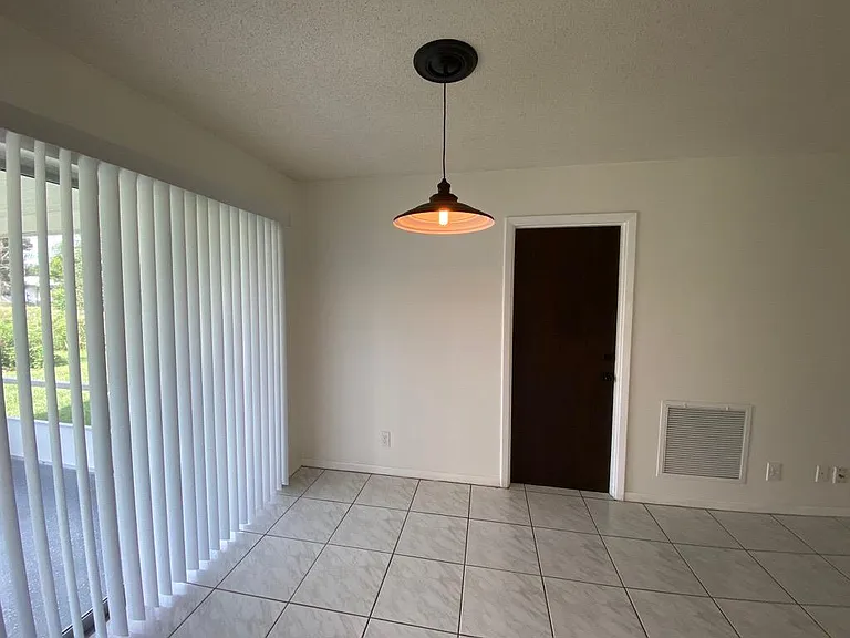 Living Room, door entrance to garage