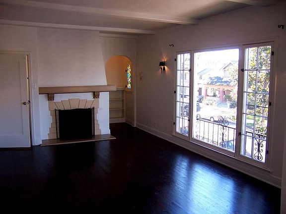 Large picture windows and gas fireplace perfect for those chilly winter months. _