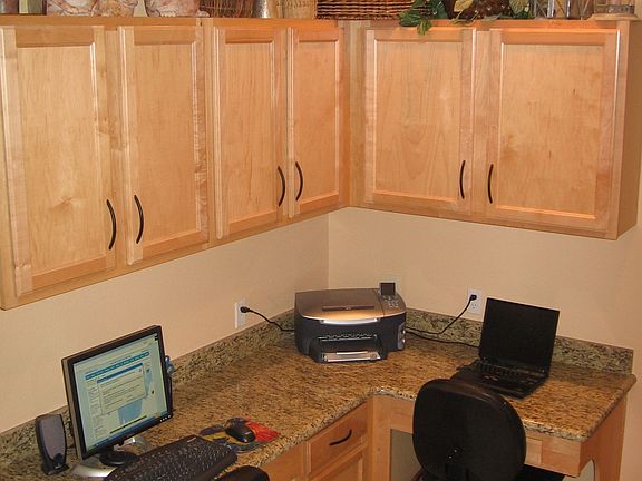 Tech/Office center w/granite&42" cabinetry.