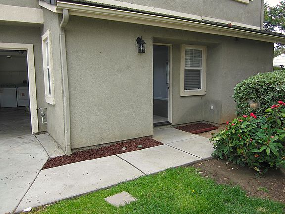 Entrance as it now appears. Garage on the left.