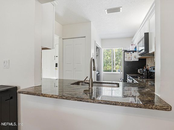4th image of 7701 BAYMEADOWS Circle W #1077
