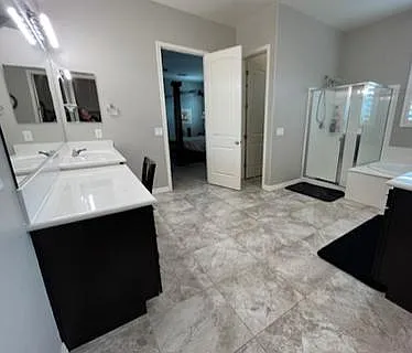 Mater bath off master bedroom. Full shower, soaking tub and double vanities.