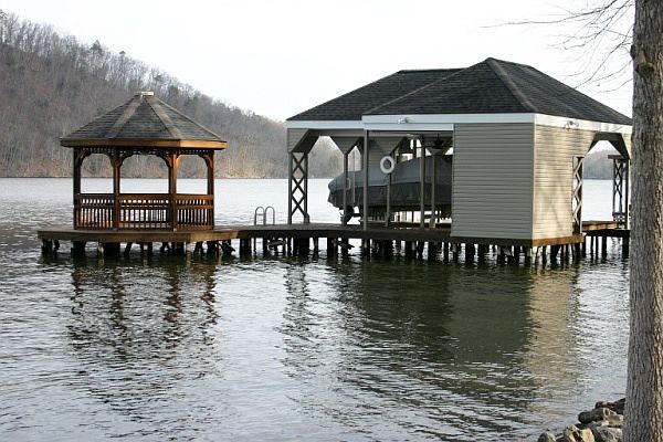 Boat House
						:
						Pier/Dock, Boat Lift, Gazebo, 2 Storage rooms, matching exterior.