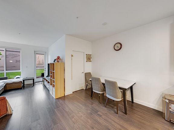 4th image of 7133 14th Ave #209
