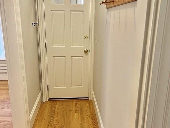 Hallway inside apartment front door.