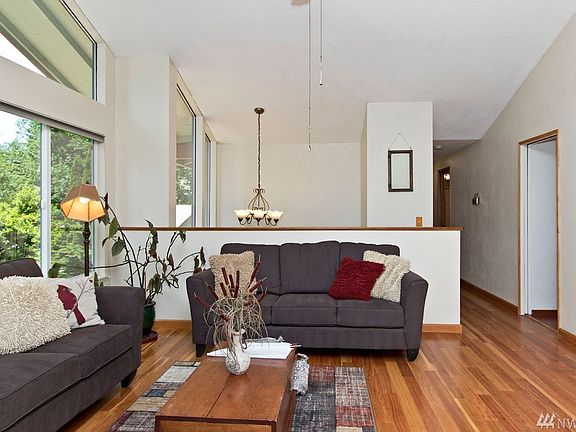 Solid, exotic hardwood throughout the main level.