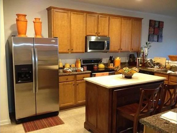 Kitchen with custom Granite counter tops and all stainless steel appliances included for luxury and comfort.