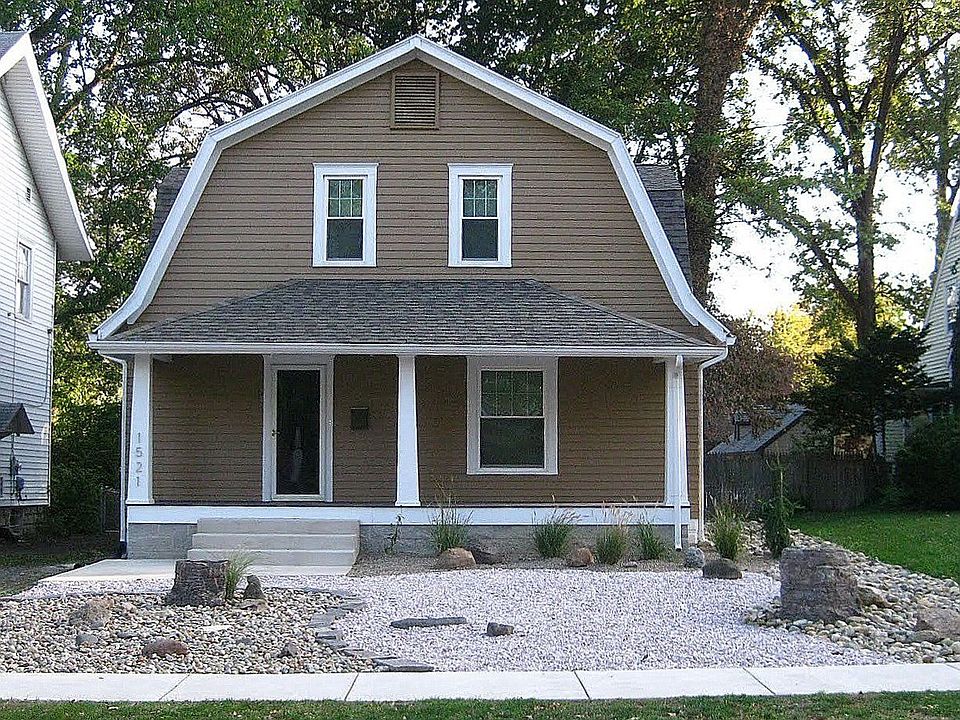 0 maint.cost hardscape balanced w/ distinct fluid lines & soft flowing grasses