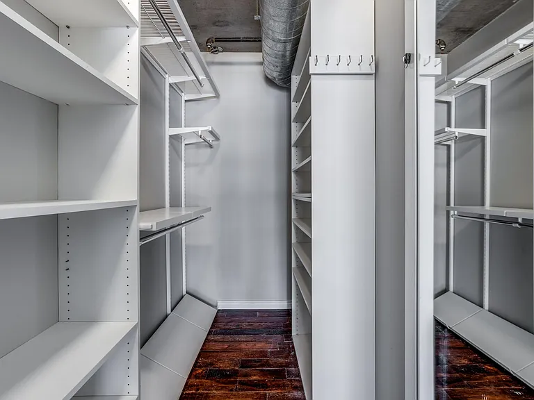 Indulge in a spacious walk-in closet that offers ample storage and organization, turning your wardrobe into a stylish sanctuary.