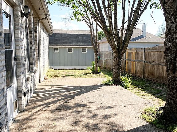 Back Patio with Storage Shed