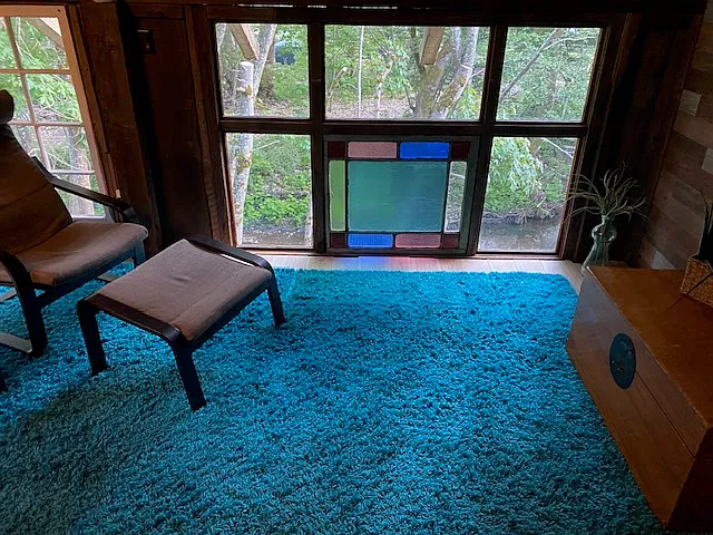 sitting area with views of the creek.