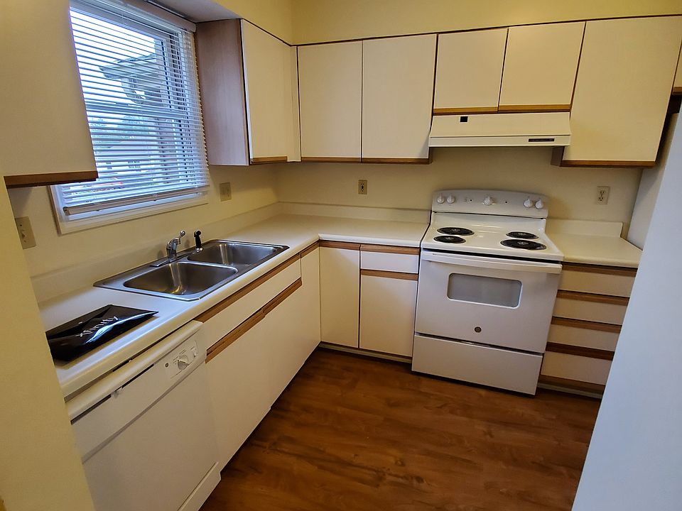 Kitchen offers Dishwasher, Stove and Refrigerator with new LVT flooring