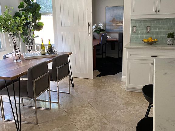 Breakfast Nook with views to the backyard Barndoor gives privacy to office nook