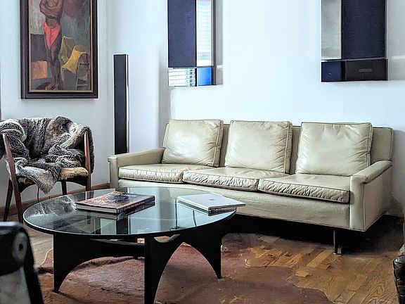 Mid Century Modern Living room, complete with sound music system.