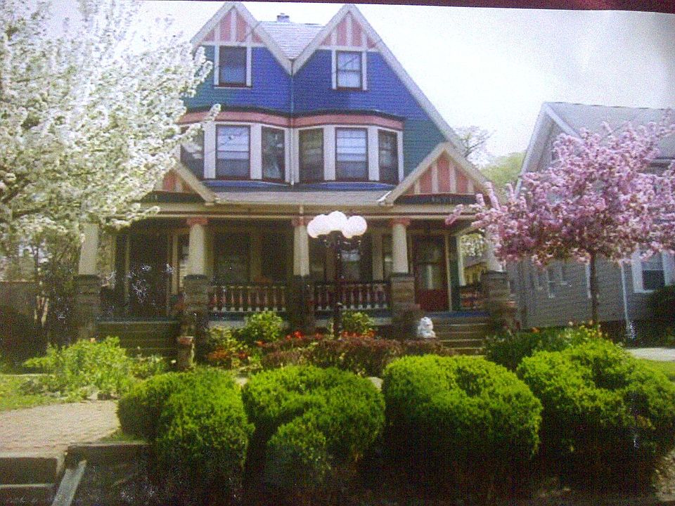 Front of House w/Spring Flowers