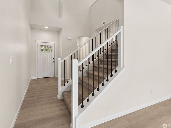 This is a representation only using the same floorplan in the community, but on a diffrerent lot. Co