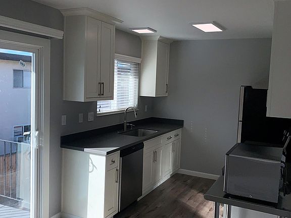 Dishwasher and Microwave Included
