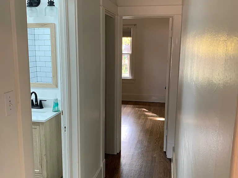 Hallway by bathroom looking at front bedroom