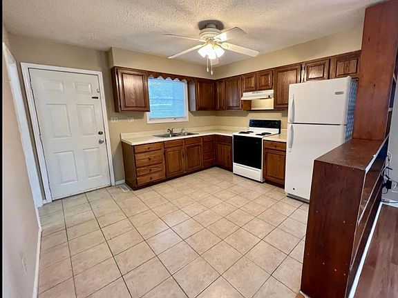 Spacious Kitchen with Tile Flooring