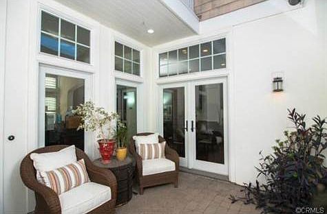 Open courtyard area leads to detached office and main house.