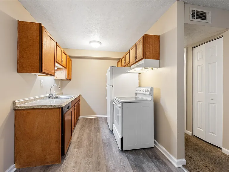 Eat-In Kitchen with Luxury Plank Flooring, Dishwasher, Fridge and Stove!