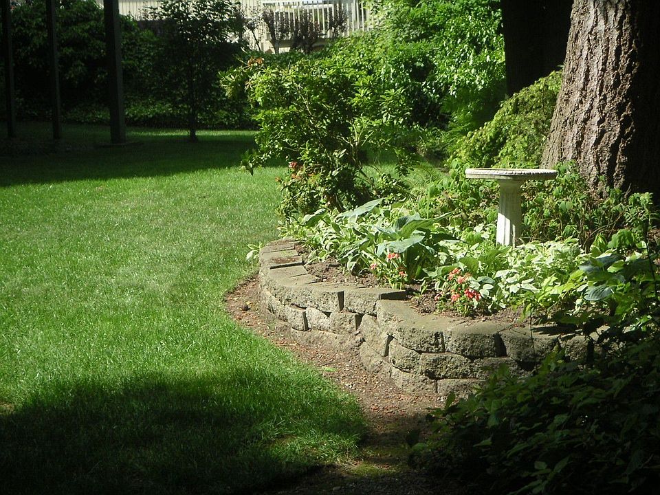 Nearly one acre of park like yard