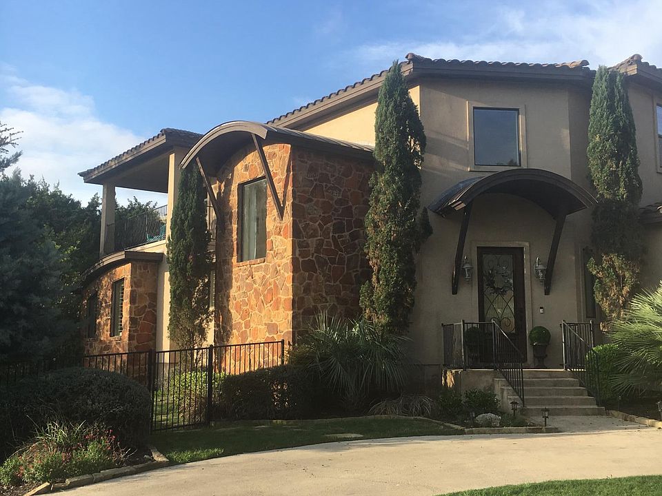 Front of house with circular drive 