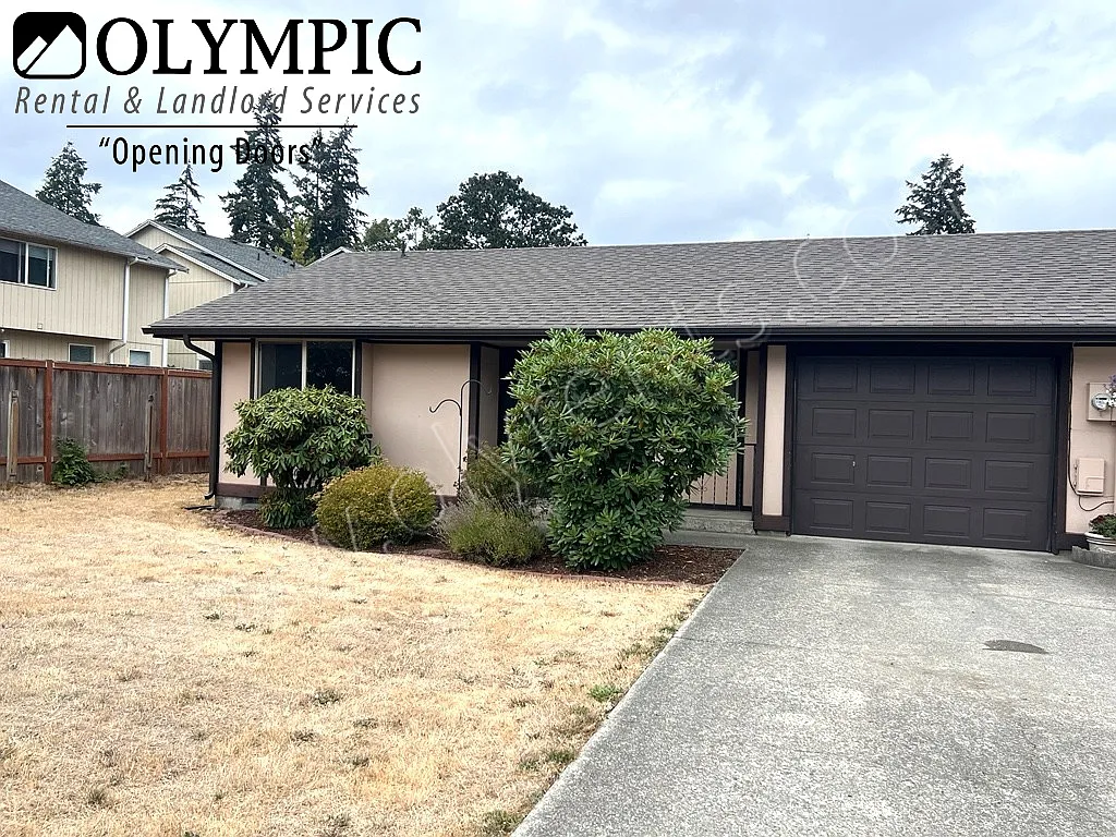 2 Bedroom, 1 Bath Single-Level Duplex with Garage & Spacious Yard — Photo 3