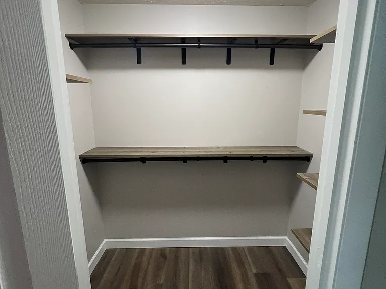 Guest Bedroom Walk-In Closet View 1