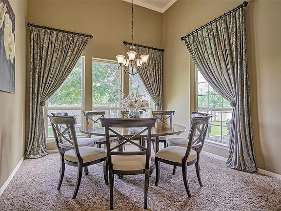 The formal dining room is so elegant. This space could also be used as an office.